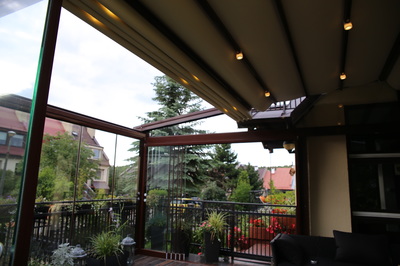  The Porolet® awning roman style canopies ride smoothly overhead in special tracks that are formed into both sides of the vinyl beams.