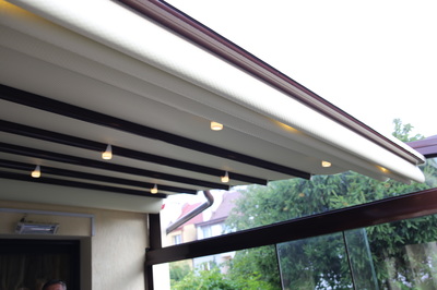 If you prefer vinyl awnings with the look of solid wood, but don't want the hassle of painting, staining or weather-sealing, you'll love 
The POROLET awning.